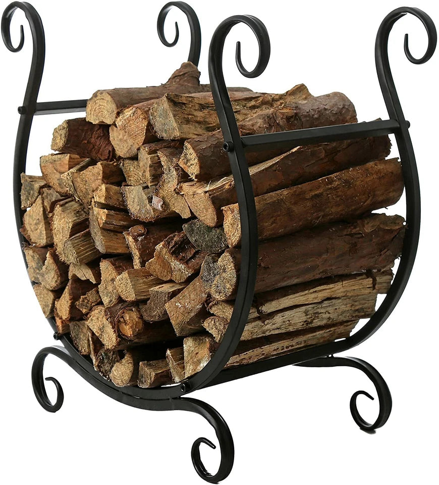 Black metal firewood rack with decorative scrollwork design, freestanding fireside log storage